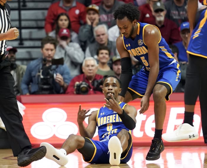 Morehead State guard Mark Freeman (0) celebrates after making a three-pointer and being fouled during the first half at Simon Skjodt Assembly Hall on Monday.